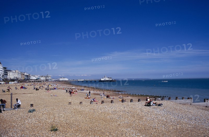 20059183 ENGLAND East Sussex Eastbourne View across shingle beach towards the pier in the far distance.