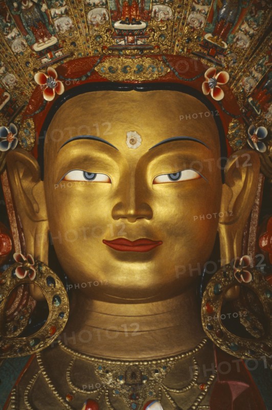 INDIA, Ladakh, General, Golden face of Buddha.  Tibetan Buddhism is practised in this area of Northern India.