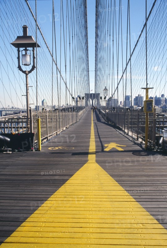 USA, New York, New York City, View along pedestrian walkway of Brooklyn Bridge
