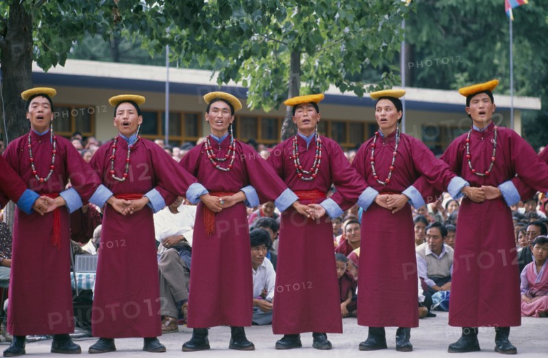 INDIA, Himachal Pradesh, Festivals, Tibetans in traditional costume celebrating the birthday of the Dalai Lama.