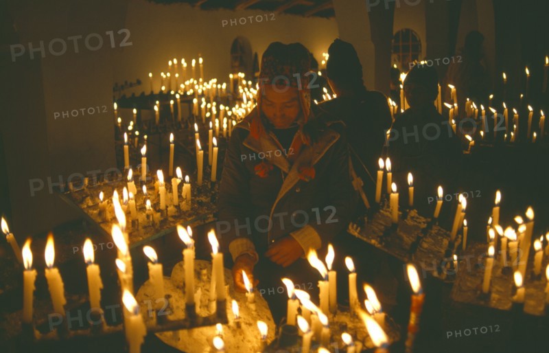 PERU, Cusco, Vilcanota Mountains, Ice Festival of Qoyllur Riti.  Pre Columbian in origin but of Christian significance today.  Worshippers at candlemass ceremony.