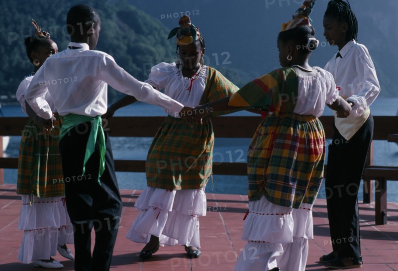 ST LUCIA, Customs, Children performing traditional dance in costume.