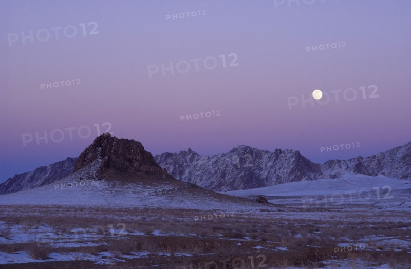 MONGOLIA, "				", Hovd Province, Mountains lightly covered in snow at sunset with pink sky. Rtnd 2 VKB 15/5/2009