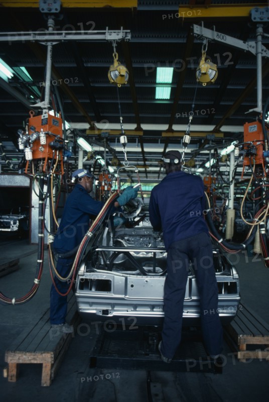 TRINIDAD, Industry, Workers in Neal and Massy Nissan car plant.