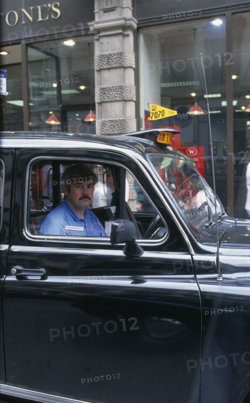 TRANSPORT, Road, Taxi, Detail of London cabbie in his taxi