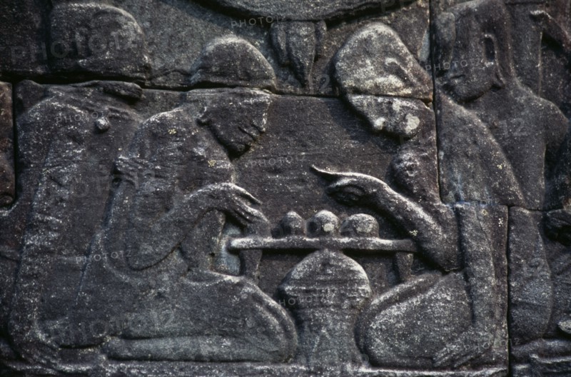 CAMBODIA, Siem Reap Province, Angkor Thom, Bayon.  Bas relief carvings on the south wall depicting everyday scenes.  Chess players.