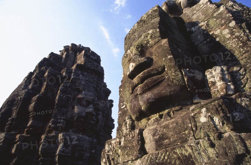 CAMBODIA, Siem Reap Province, Angkor Thom, The Bayon.  Detail of huge face thought to be that of Jayavarman VII on one of the four faced towers