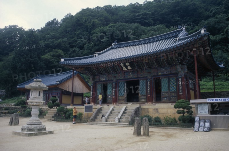 SOUTH KOREA, Kangwon, Soraksan Nat. Park, Shinhungsa Temple.  Exterior of Zen meditation temple first built in 653 AD.  Rebuilt in 1645 and again after the Korean War after twice being burnt to the ground.