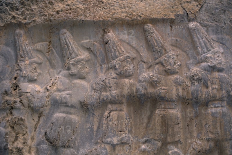 TURKEY, Central Anatolia, Corum, Hattusas.  Ancient site of Hittite capital.  Stone relief carving in the Great Temple dedicated to the storm god Teshub and the sun goddess Hebut.