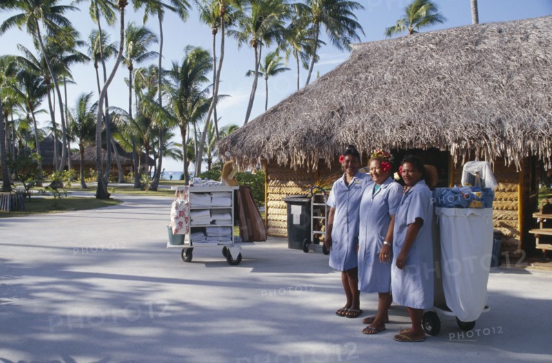 PACIFIC ISLANDS, French Polynesia, Tuamotu Islands, Ringiroa.  Women workers in hotel complex.