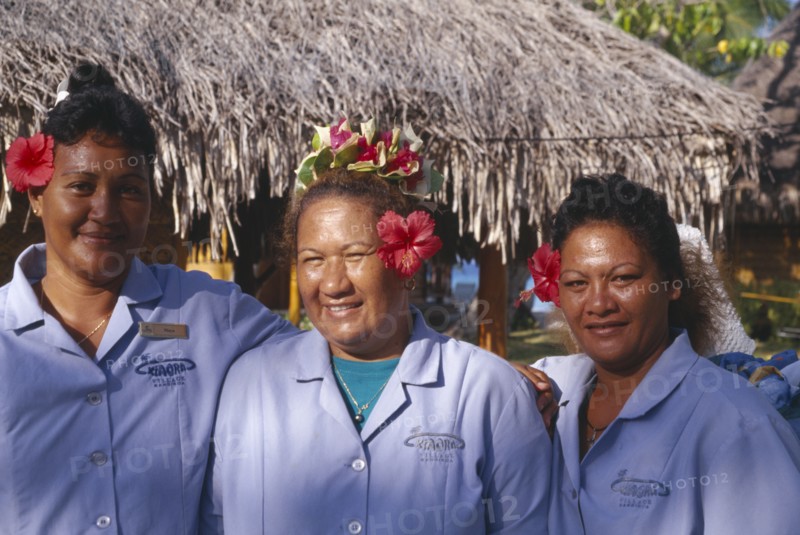 PACIFIC ISLANDS, French Polynesia, Tuamotu Islands, Ringiroa.  Portrait of women workers in hotel complex.