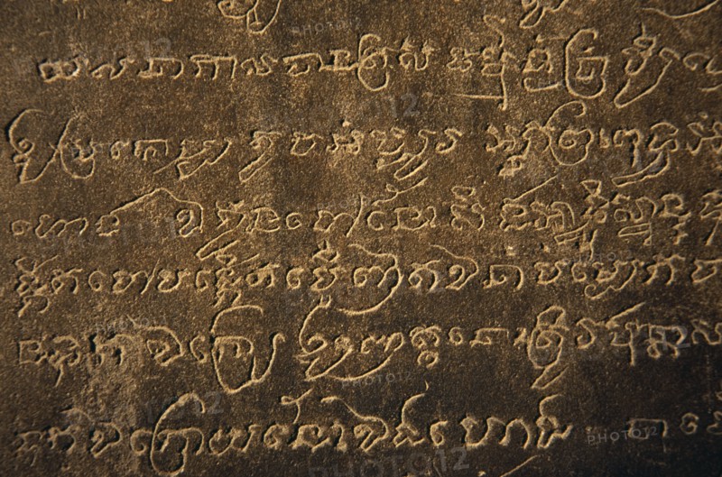 CAMBODIA, Siem Reap Province, Angkor Wat, Detail of carved sanskrit text on third level of temple.