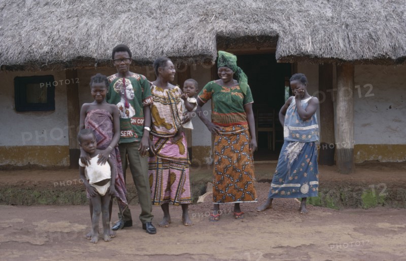 CONGO, Tribal People, Portrait of family group.  Man with two wives and three children.