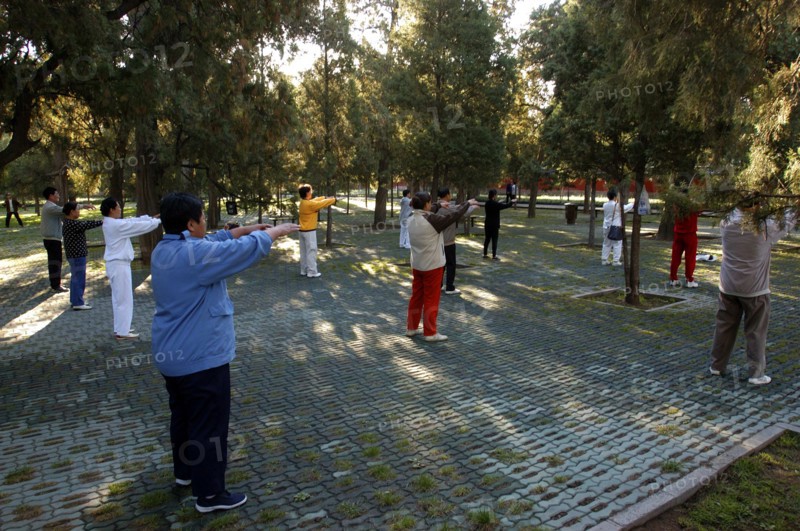 CHINA, Beijing, Group of people doing Tai Chi in the park