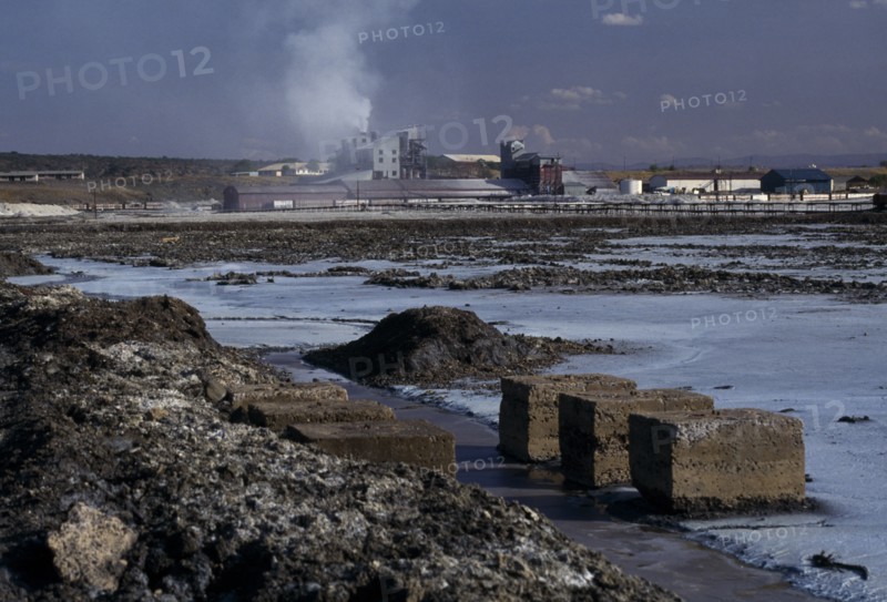 KENYA, Lake Magadi, View across Magadi Soda Lake towards factory buildings.