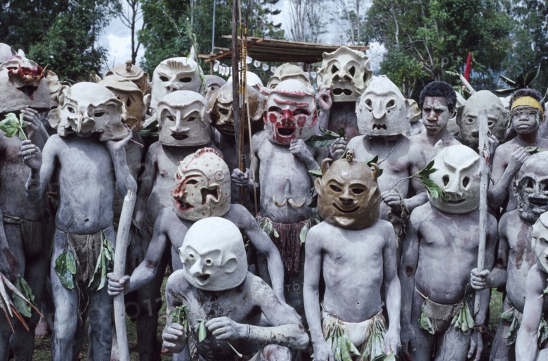 PAPUA NEW GUINEA, Goroka, Asaro mudmen at Goroka Cultural Show.