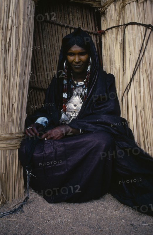 NIGER, People, Women, Portrait of Tuareg woman wearing full bridewealth jewellery.