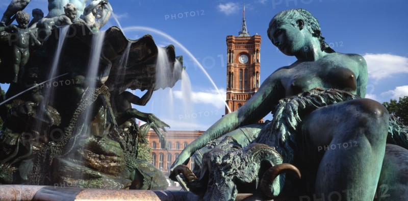 GERMANY, Berlin, Alexanderplatz. View of the Rathaus seen from the Neptune Fountain in the immediate foreground