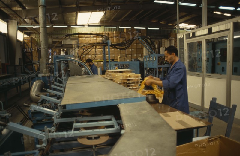 EGYPT, Cairo, Worker in air filter factory
