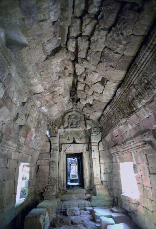 CAMBODIA, Angkor, Interior view of Ta Prohm 12th century Temple ruins