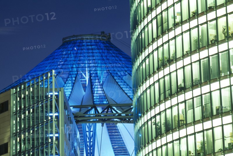 GERMANY, Berlin, Potsdamer Platz. City architecture and The Sony Centre illuminated at night