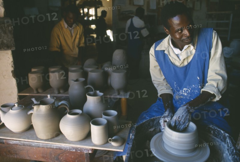 MALAWI, Dedza, Pottery producing fair trade goods for export.