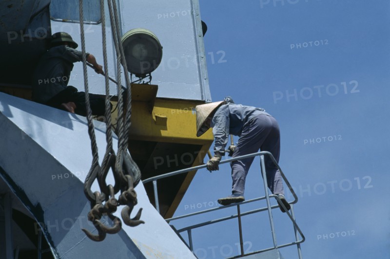 VIETNAM, North, Haiphong, Maintenance worker at Doan Xa container terminal.