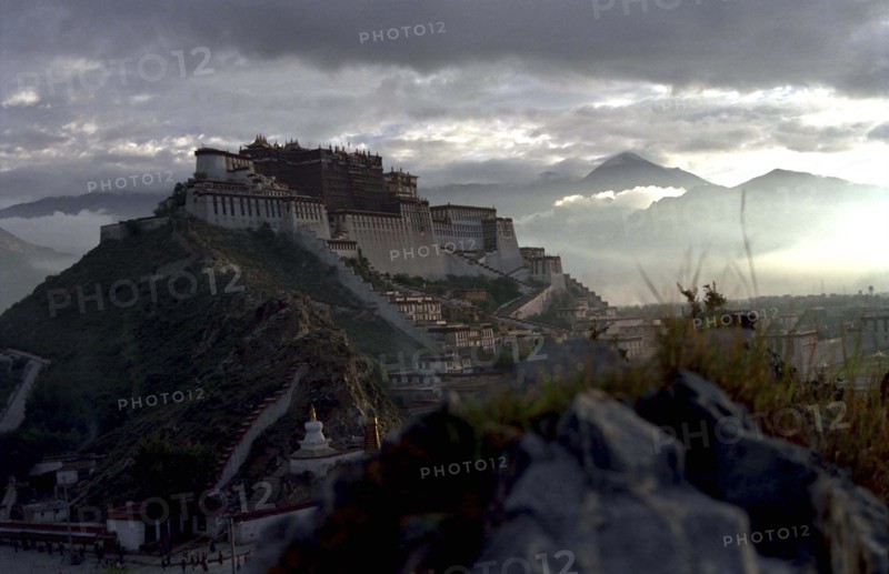 CHINA, Tibet, Lhasa, View toward the hilltop Potala Palace seen in evening light