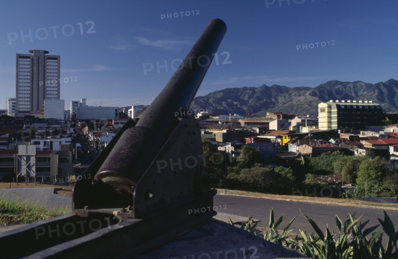 COSTA RICA, San Jose, View over city with old cannon in the foreground