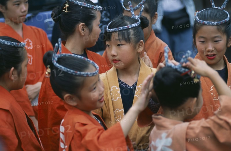 JAPAN, Chiba, Tako, 10-12 year old girls called tekomae in traditional costume during July Gion Matsuri from Uemachi neighborhood