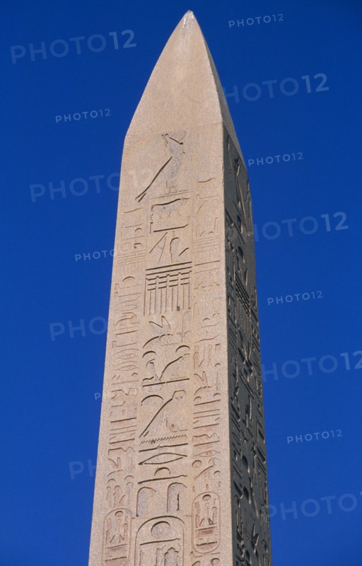EGYPT, Nile Valley, Karnak, Precinct of Amun.  Hatshepsut obelisk with relief carving and hieroglyphics.
