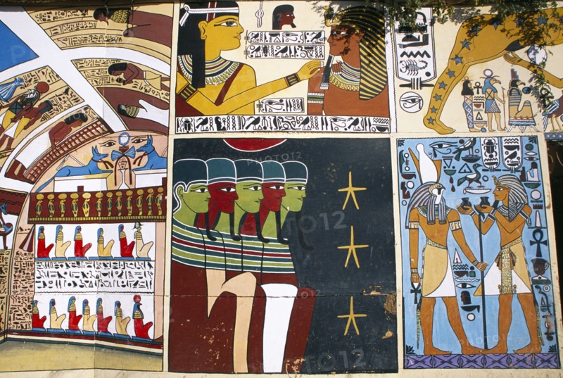 EGYPT, Dra Abul Naga, Detail of painted mural on exterior wall of alabaster shop.