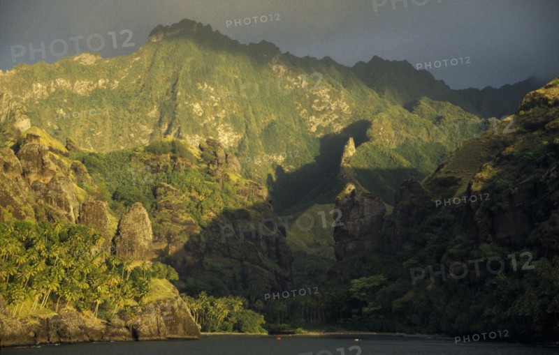 PACIFIC ISLANDS, Polynesia, Marquesas Islands, Fatu Hiva Island.  Landscape near Hanavave at sunset.