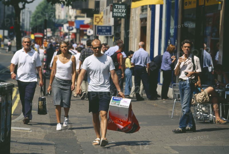 ENGLAND, London, Oxford Street shoppers and pedestrians.