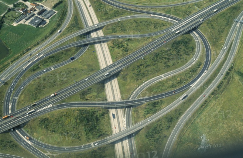 ENGLAND, Essex, Transport, Aerial view of junction on the M25 and M11 motorways at Epping