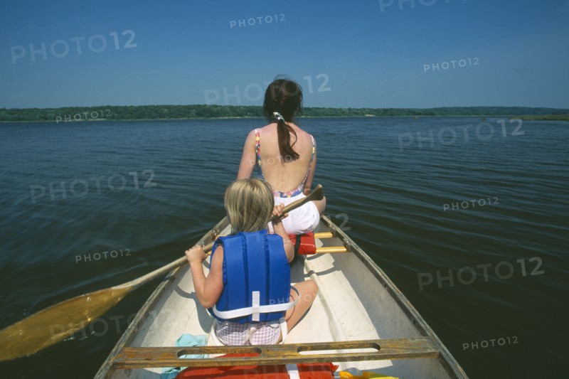 FAMILY, Children, Mother and Child, Mother and daughter canoeing on the Westport River in Massachusetts USA