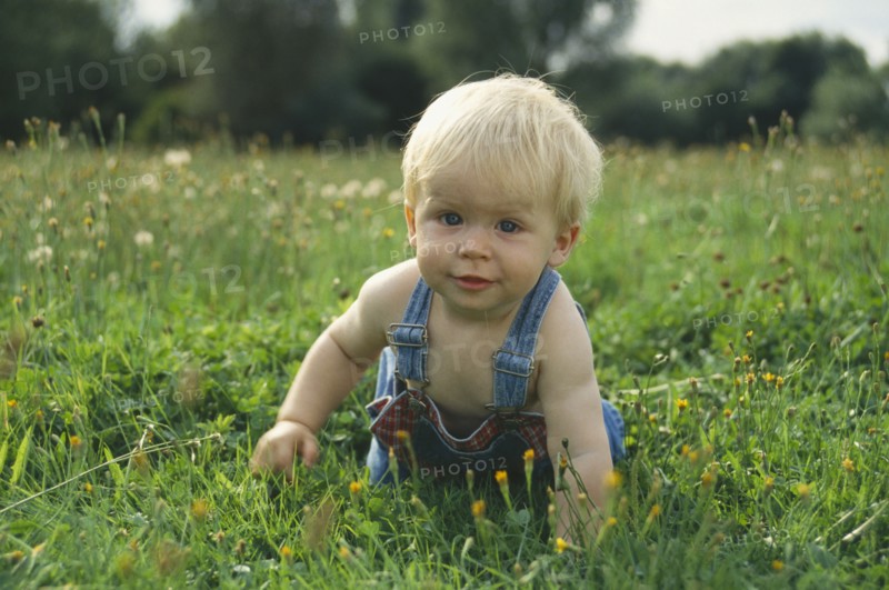 CHILDREN, Babies, One year old baby boy crawling on the grass