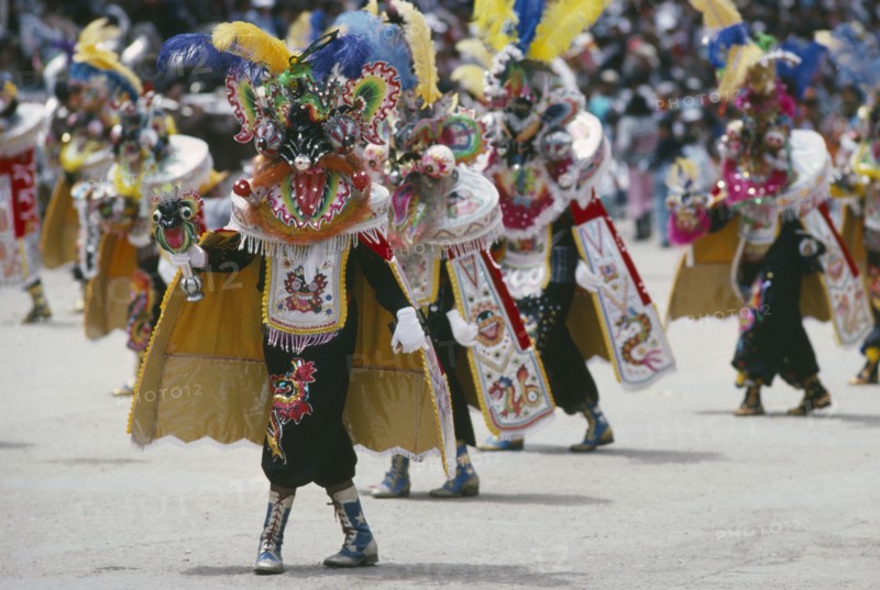 BOLIVIA, Oruro, Carnival masqueraders in colourful animal costumes