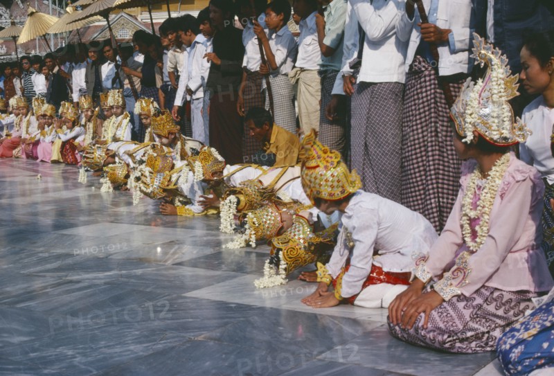 MYANMAR, Religion, Shwedagon Pagoda.  Initiation of novices monks and nuns at Shinpyu ceremony.