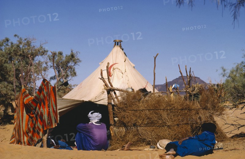 ALGERIA, People, Tuaregs outside tent.