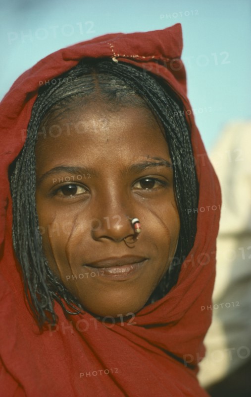SUDAN, Tribal People, Portrait of a young Eritrean woman with scarified cheeks and a nose ring