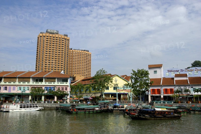 SINGAPORE, General, Junks on Singapore River with city architecture on the opposite bank