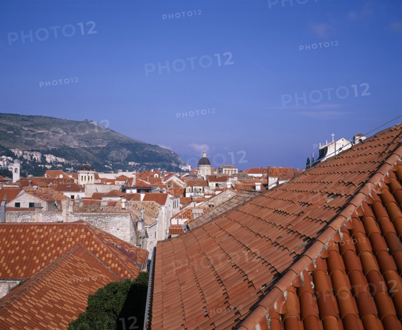 CROATIA, Dalmatia, Dubrovnik, View over tiled rooftops toward the Cathedral dome