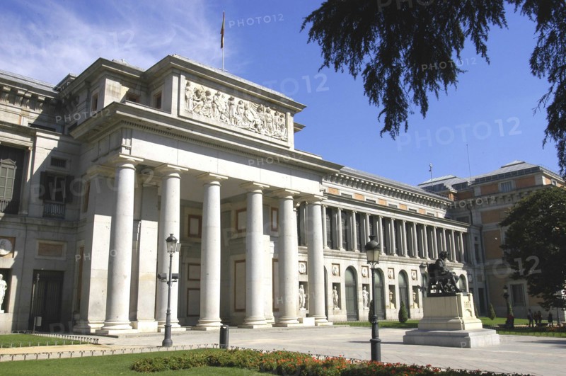 SPAIN, Madrid, Prado Museum columned entrance with statue outside