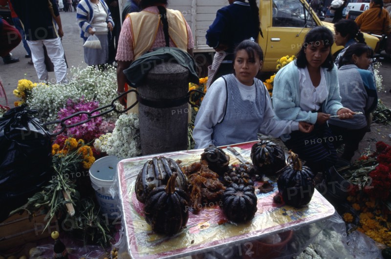 MEXICO, Michoacan State, Patzcuaro, Sugared pumpkin for Day of the Dead for sale in street market.