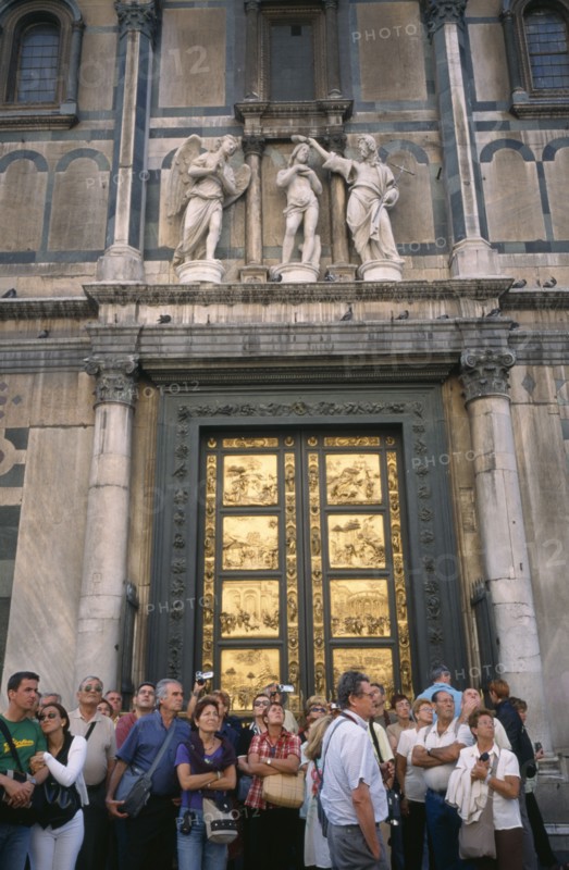 ITALY, Tuscany, Florence, Tourists at Baptistry doors.