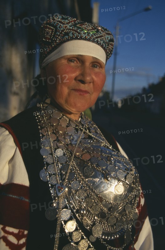 ESTONIA, Rakvere, Folk dancer in traditional costume.  Portrait.