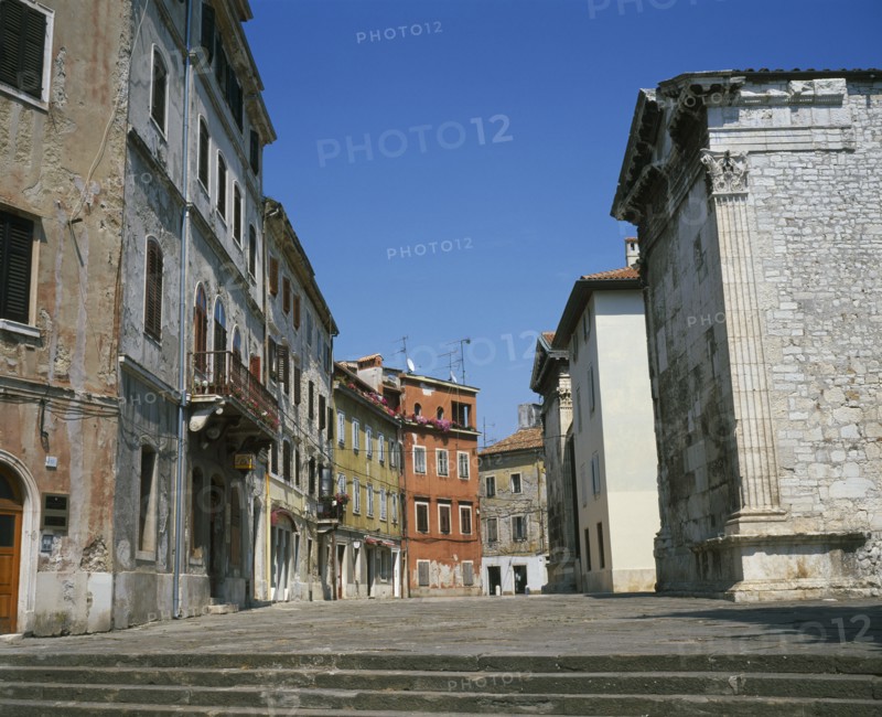 CROATIA, Istria, Pula, Street on the site which was once the Roman Forum at the back of the Temple of Romae and Augustus