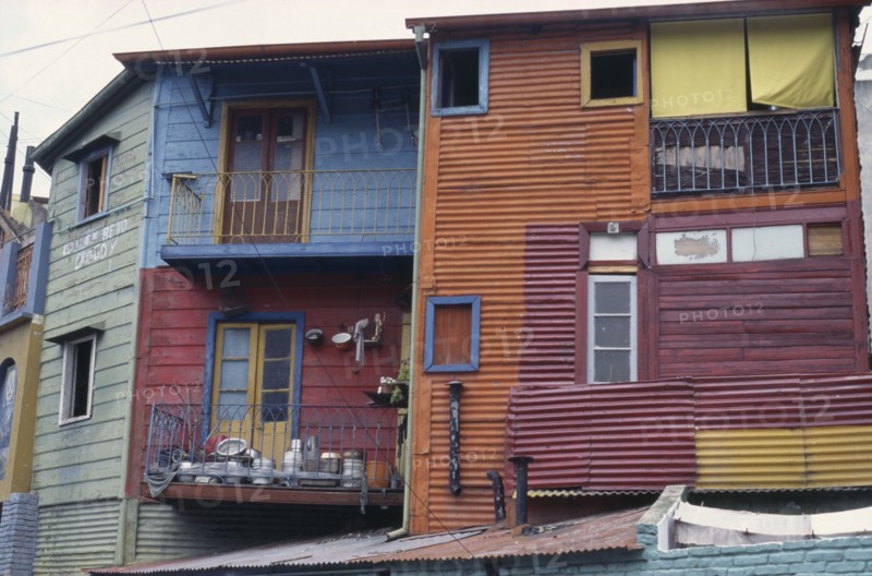 ARGENTINA, Buenos Aires, La Boca.  Brightly painted houses in the old port district.