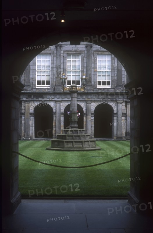 SCOTLAND, Lothian, Edinburgh, Holyrood Palace internal courtyard with surrounding colonnades and central monument